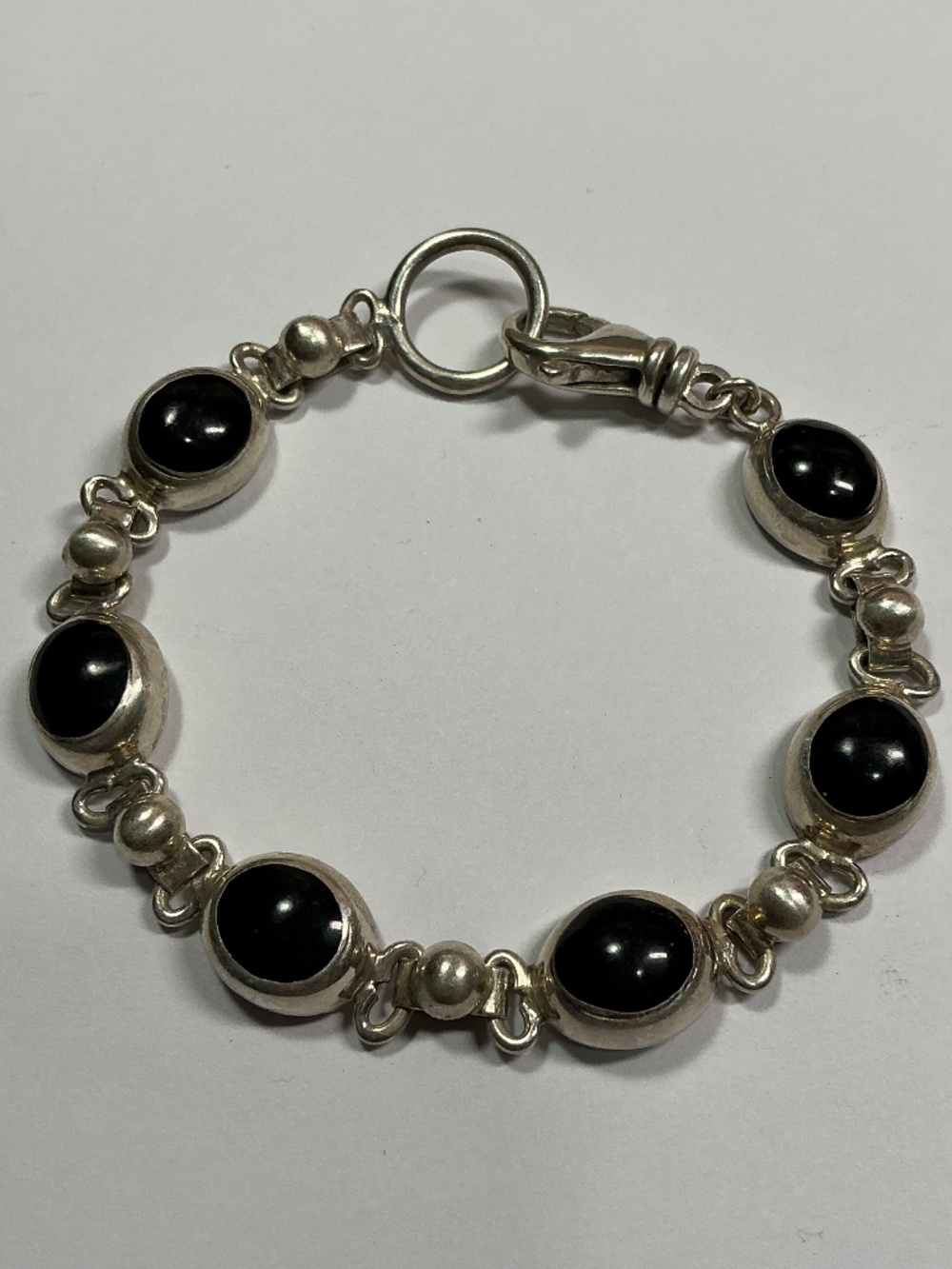 Sterling Silver Oval Shaped Black Onyx Link Bracelet. 7 inches long